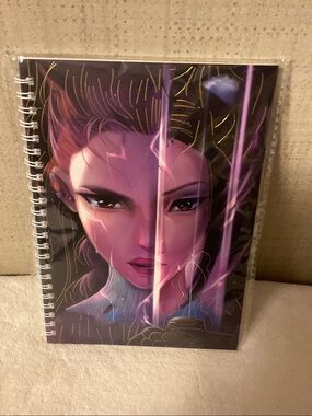 Purple Illustrated Spiral Notebook with Dramatic Face Art